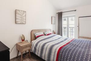 Appartements 2 chambres, hyper-centre, stationnement prive gratuit : photos des chambres