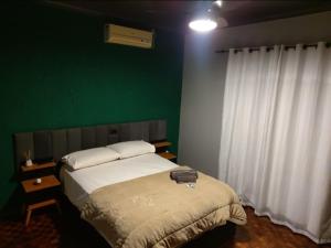 Recanto Arvoredo casa 3 quartos piscina garagem e NF para 12 hospedes