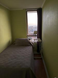 Habitación con vista al mar en cómodo depto céntrico