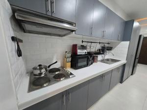 BGC Center Decent 74sqm, 2br, 2baths, 4beds with maid quarter