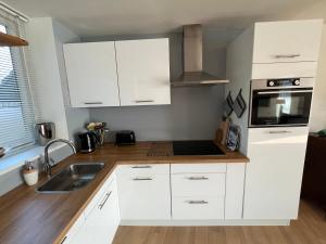 Lemmer House - Luxe familiehuis aan het water