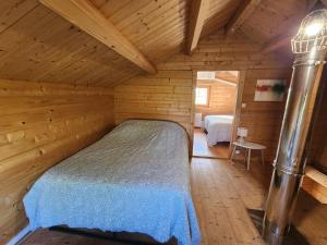 Chalets Le Chalet « au Fil de l’eau » : photos des chambres