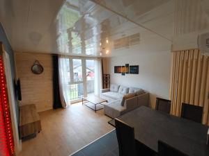 Appartements Appartement Balneo vue sur cascade : photos des chambres