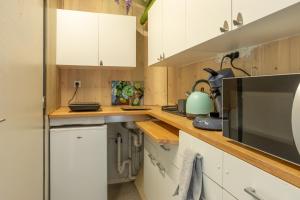 Appartements Studio - 2 lits doubles - parking : photos des chambres