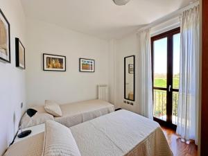 229 - Appartamento trilocale al primo piano con ampio terrazzo - al residence Adamo ed Eva con piscina e campo da calcetto climatizzato, SPIAGGIA WHITE BEACH CLUB inclusa