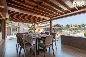 StayVista at Aura Farmstay with Pool & Lawn