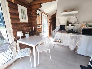 Rozes Oga, Tūrisma mītnes namiņš