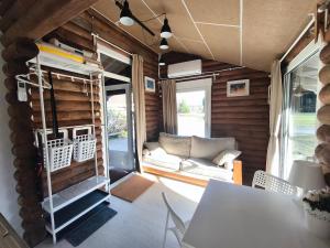 Rozes Oga, Tūrisma mītnes namiņš