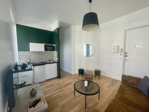 Appartements Charming Central Apartment - Reims : photos des chambres
