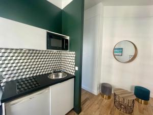 Appartements Charming Central Apartment - Reims : photos des chambres
