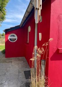 Maisons de vacances La petite maison rouge : photos des chambres