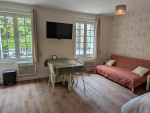 Appartements Studios du Marche au Bois : photos des chambres