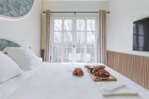 Appartements Divine Couture - Suite Montaigne : photos des chambres