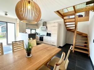 Ferienwohnung Wasser mit Sauna Kamin Meerblick und Dachterrasse nahe Ostsee auf Rügen