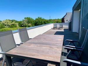 Ferienwohnung Wasser mit Sauna Kamin Meerblick und Dachterrasse nahe Ostsee auf Rügen