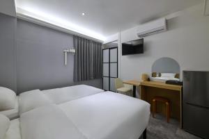 Phòng Hai Giường Đơn Loại Sang (Deluxe Twin Room)