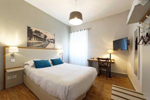 Hotels Contact Hotel du Commerce et son restaurant Cote a Cote : photos des chambres
