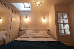 Appartements Appartement Le Balcon de L-Oust : photos des chambres