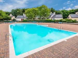 Maisons de vacances cottage cosy du golf avec piscine : photos des chambres