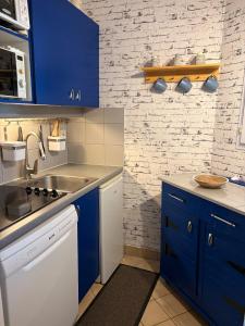 Maisons de vacances cottage cosy du golf avec piscine : photos des chambres