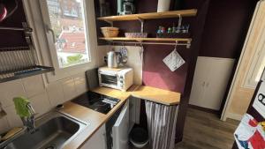 Appartements Appartement ancien cosy : photos des chambres