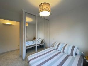 Appartements Appartement T4 tres bien situe et climatise : photos des chambres