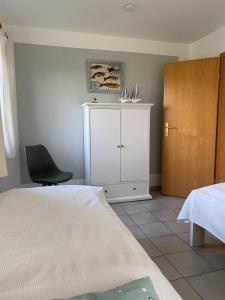 Wenke Perle - Kamin, Wintergarten & Sonnenterrasse