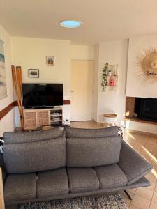 Maisons de vacances cottage cosy du golf avec piscine : photos des chambres