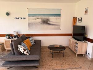 Maisons de vacances cottage cosy du golf avec piscine : photos des chambres