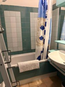 Maisons de vacances cottage cosy du golf avec piscine : photos des chambres