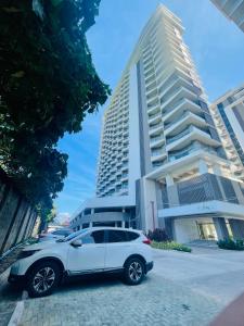 Condo with Private Beach at Tambuli Beach Resort near Airport in Cebu