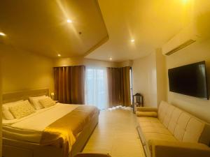 Condo with Private Beach at Tambuli Beach Resort near Airport in Cebu