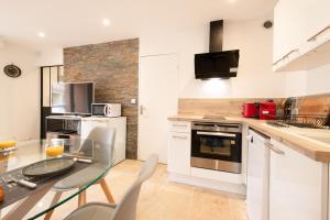 Appartements Real Regina garage prive centre ville et plage : photos des chambres