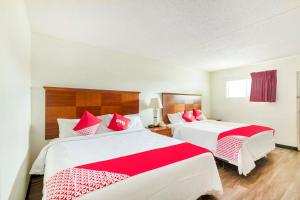 King Room with Two King Beds room in OYO Hotel San Antonio Lackland Air Force Base North