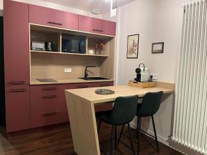 Appartements La Promenade : photos des chambres