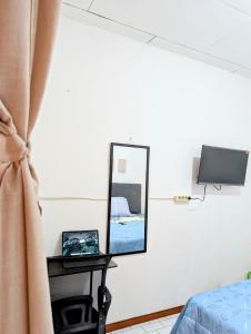 Homey Guesthouse Sukomanunggal Syariah