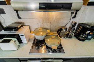 beautifully two bedroom apartment with heated swimming pool fully equipped gym ample parking space children playground and relaxing rooftop with breathtaking views