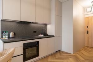 Global Park Beige Chic Studio by BookingHost