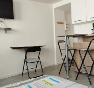 Appart'hotels Trois Studios-Cosy centre village : photos des chambres