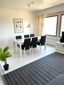 Rauhaisa rivitalo kolmio saunalla