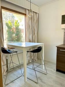 Rauhaisa rivitalo kolmio saunalla