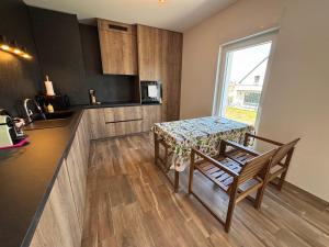 Appartements L-Isenciel - Maison de plain pied avec Jardin et Parking : photos des chambres