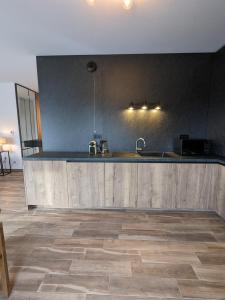 Appartements L-Isenciel - Maison de plain pied avec Jardin et Parking : photos des chambres