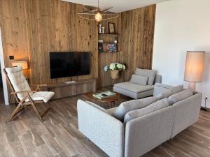 Appartements L-Isenciel - Maison de plain pied avec Jardin et Parking : photos des chambres