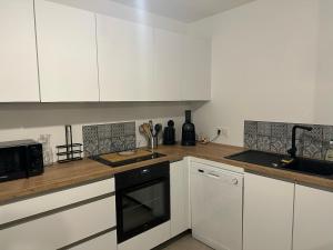 Appartements I Sognu - Charmant Appartement Neuf Proche du Port : photos des chambres