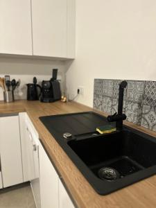 Appartements I Sognu - Charmant Appartement Neuf Proche du Port : photos des chambres