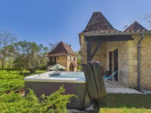 Maisons de vacances Jolie maison avec jacuzzi pour 8 personnes : photos des chambres