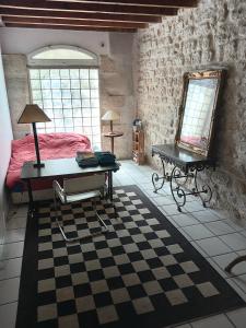 Appartements Charmant loft dans maison ancienne : photos des chambres