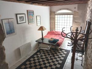 Appartements Charmant loft dans maison ancienne : photos des chambres