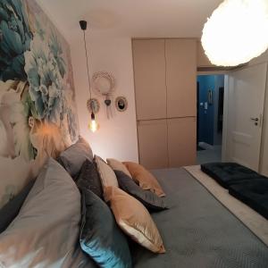 Apartamenty Centrum Warszawska 66 niebieski i różowy